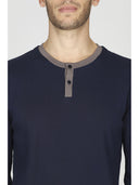 Pigiama serafino in morbido interlock di puro cotone blu, con taschini