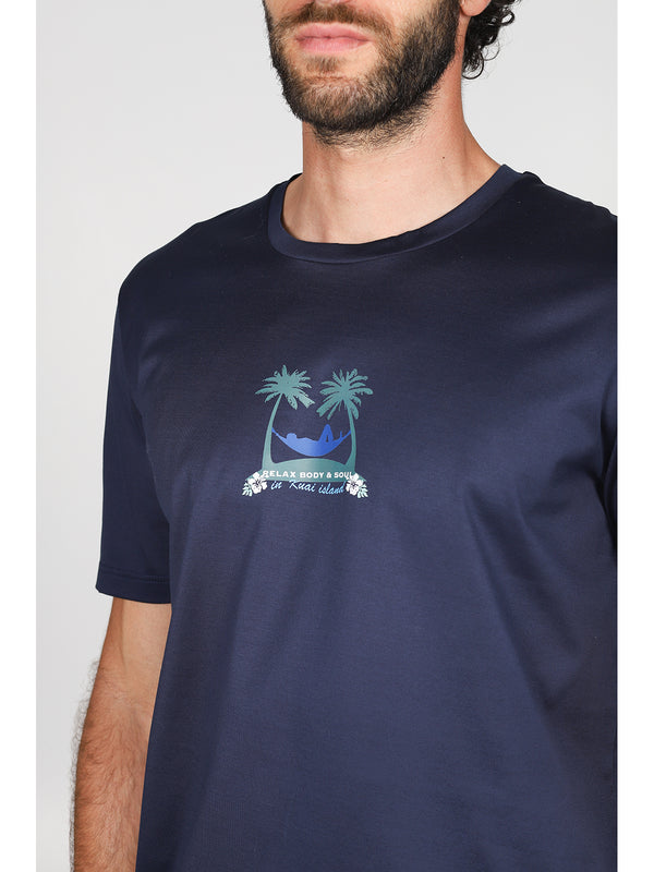 T-shirt in jersey di puro cotone blu, con stampa piazzata "palme"